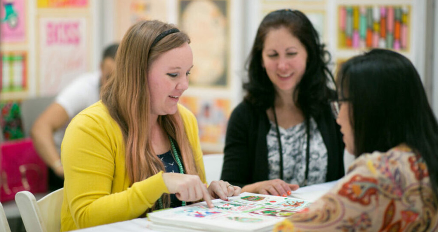 Attendees exploring art